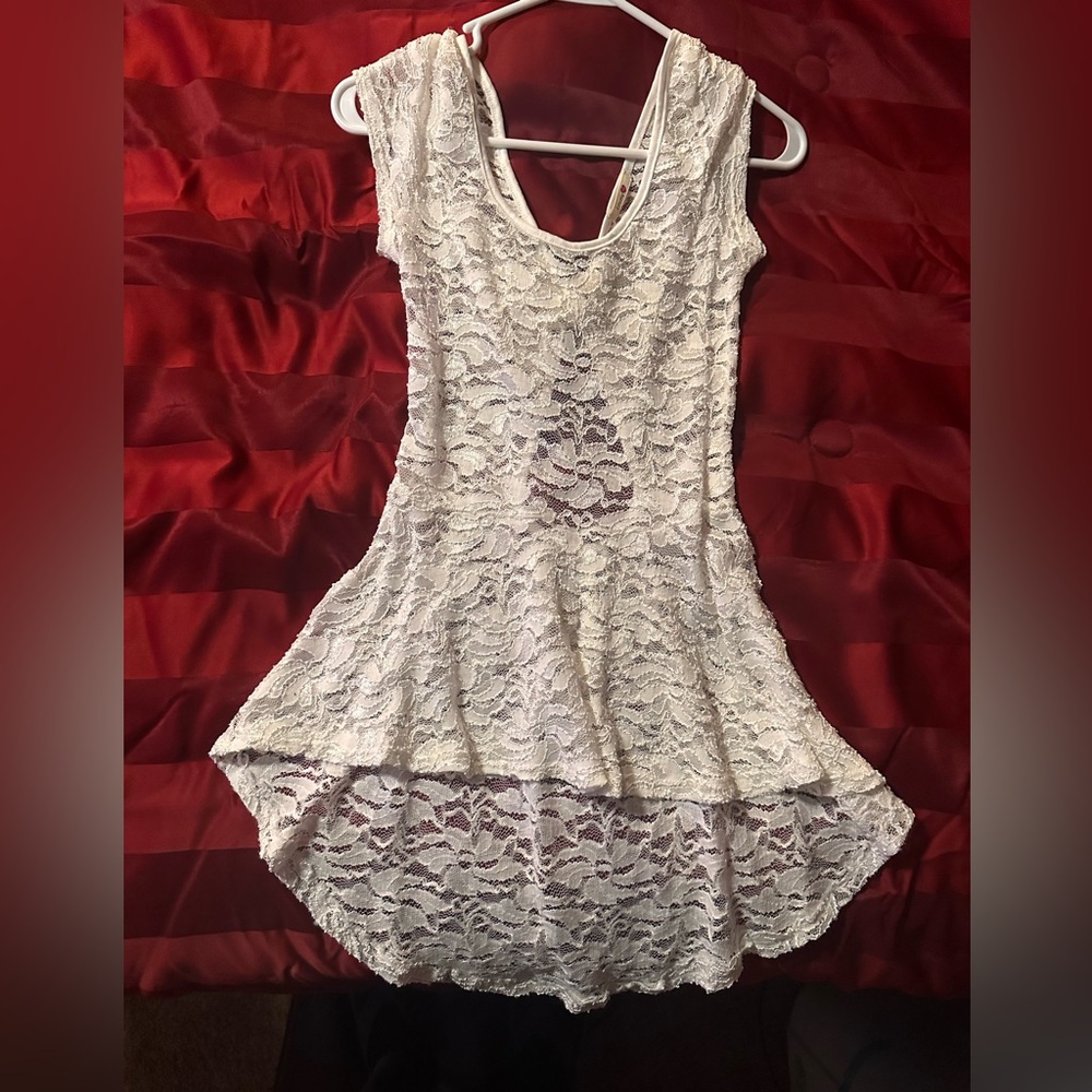 Gentle worn White lace shirt with open back. Size Medium.